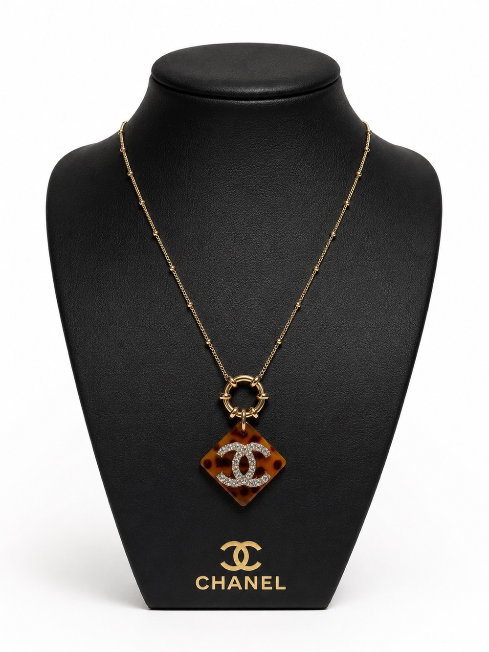 CHANEL Gold-Tone Tortoiseshell Pendant Necklace with Crystal CC Emblem